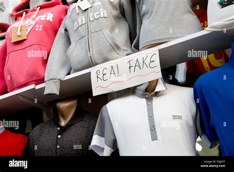 tomlense store fake designer clothes|Fashion brands want you to be able to identify fake designer  .